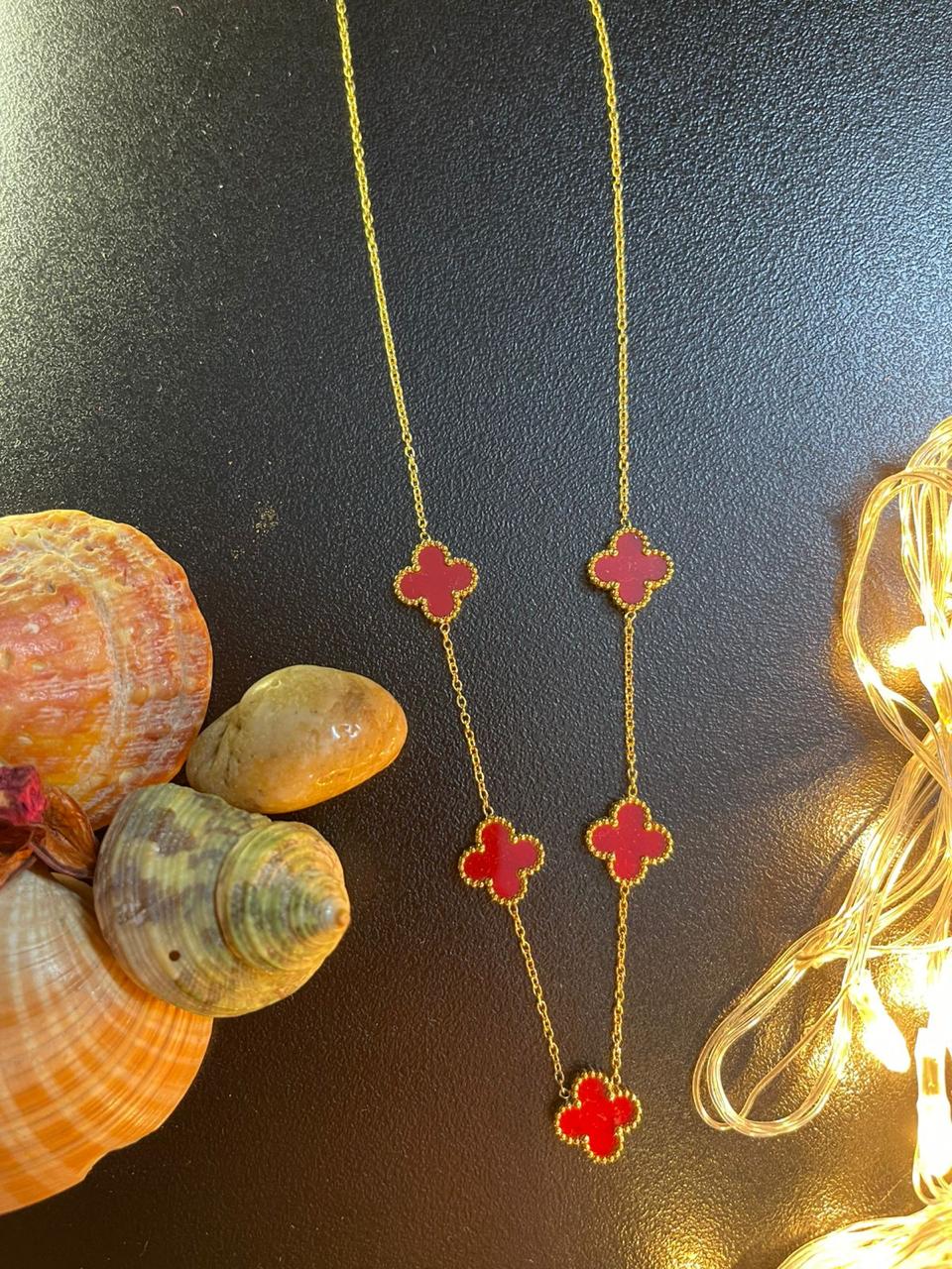 The clover Necklace in Crimson Red